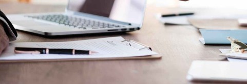 two person in formal attire doing shakehands